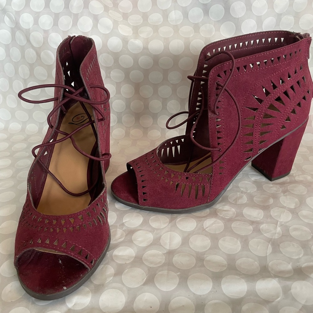 Beautiful Heart in D maroon lace up heel. Size 7